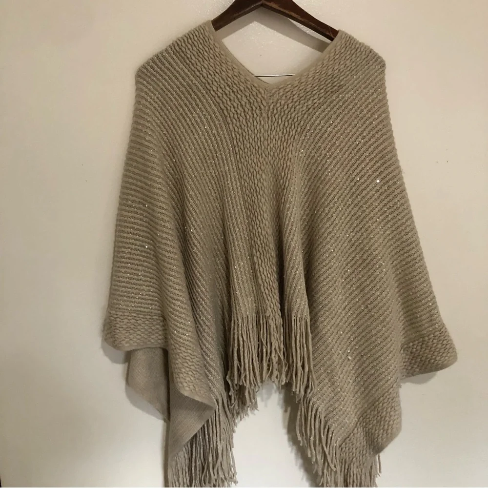 Tan knitted metallic gold fringe hem poncho